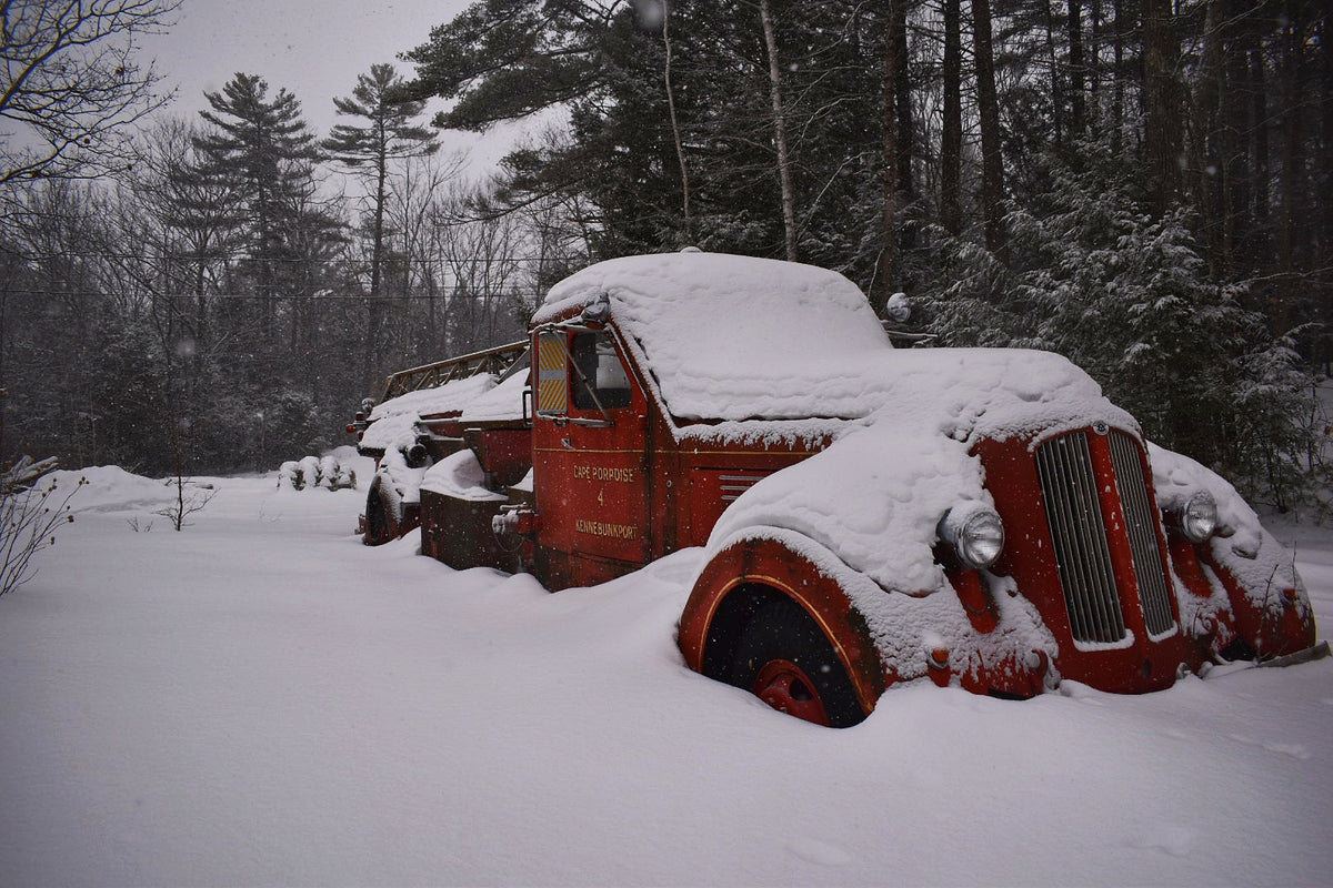 Falling Snow Covers Abandoned Vintage Truck
