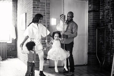 family with swing black and white