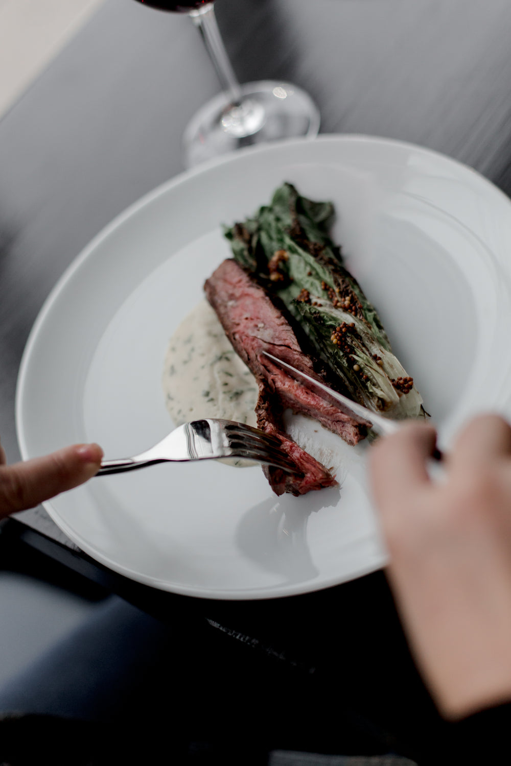 fancy plate of steak and salad