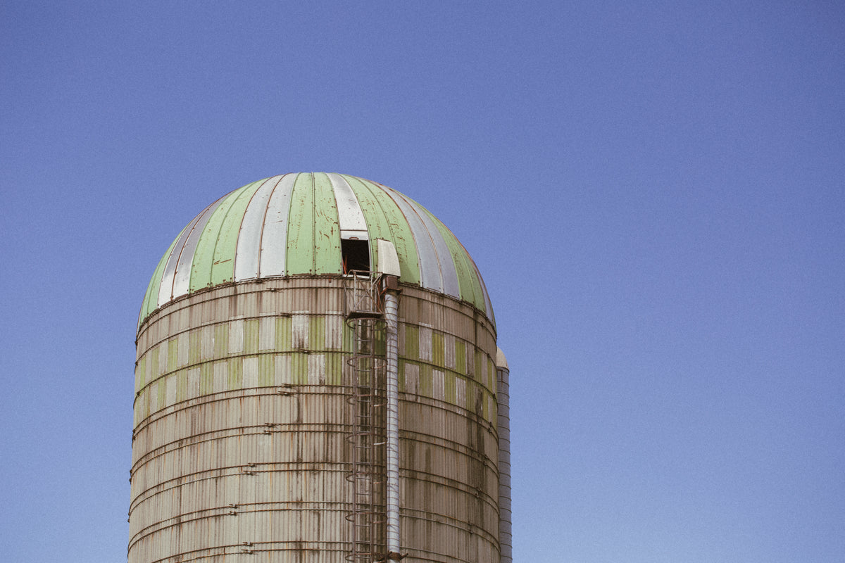 farm silo with blue sky
