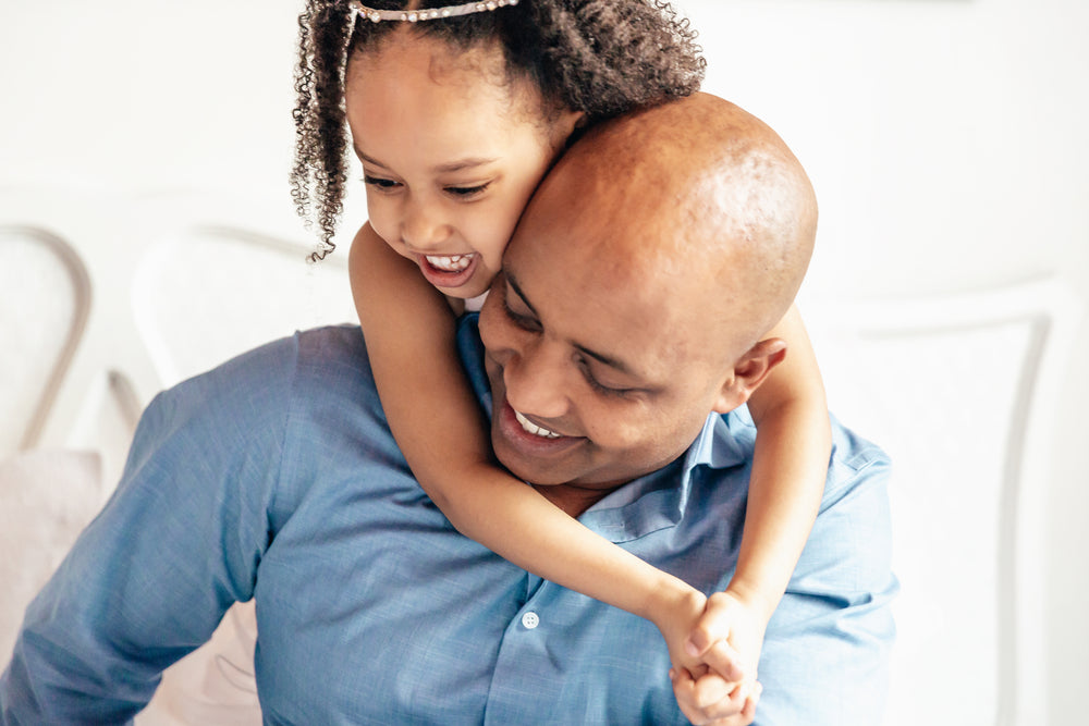 father and daughter having fun