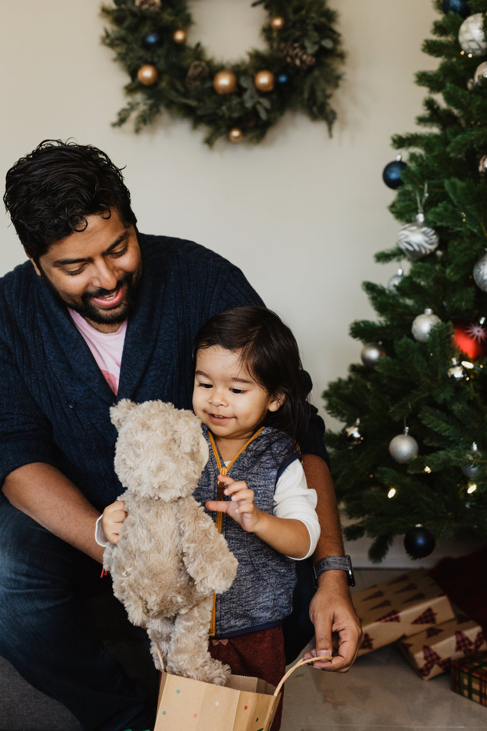 father and son open presents