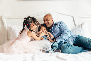 father playing with his kids