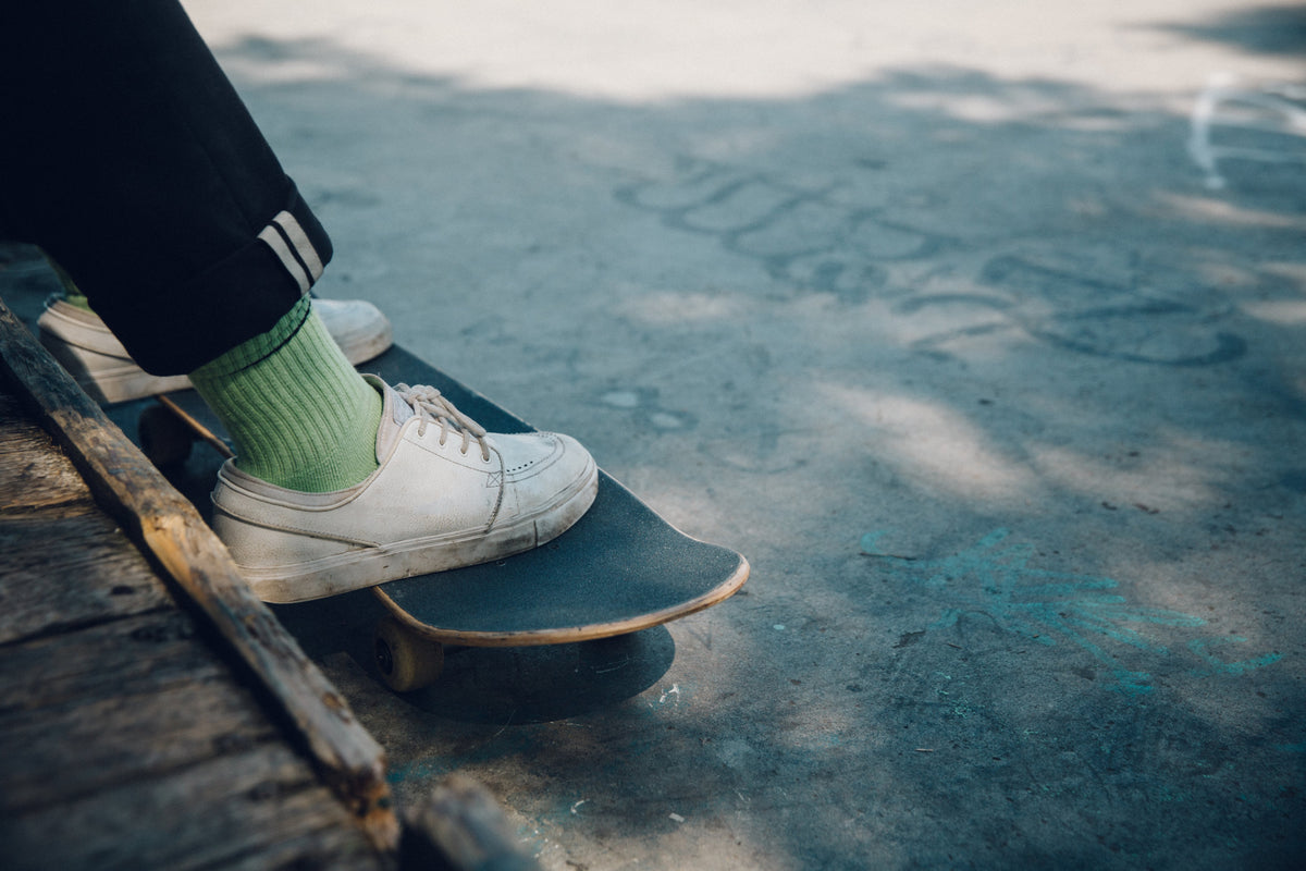 feet on skateboard