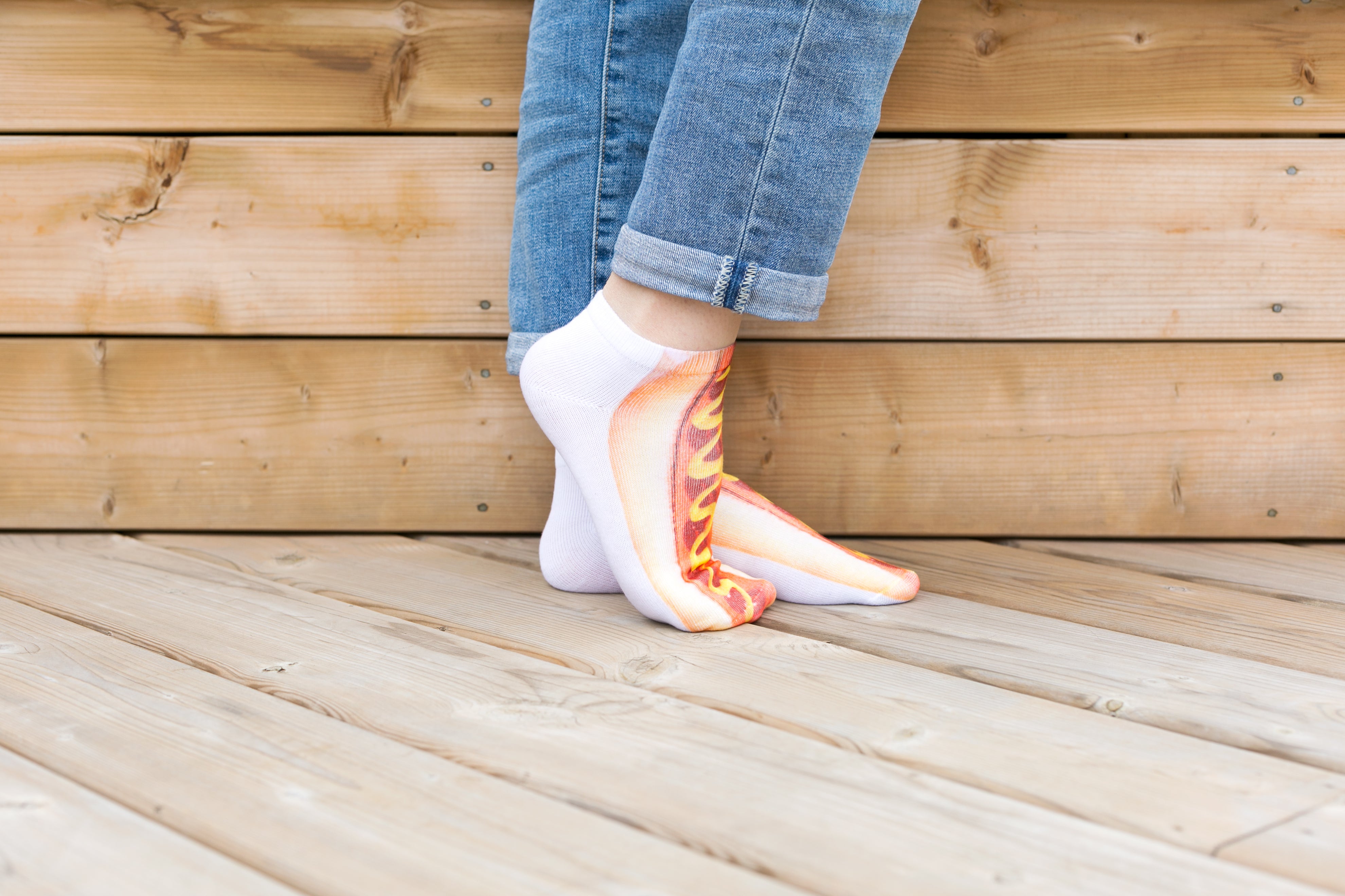 Picture of Feet Pose In Hot Dog Socks — Free Stock Photo