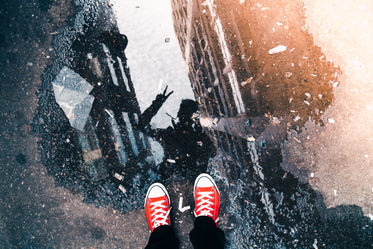 feet & puddle reflection