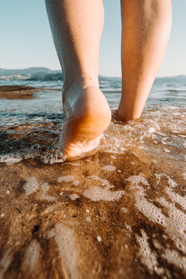 feet walk into the water