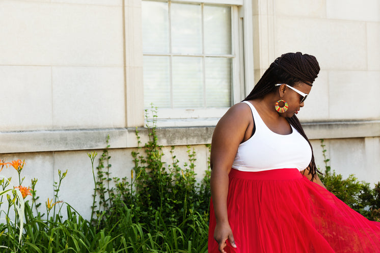 Female Fashion Model With Red Skirt