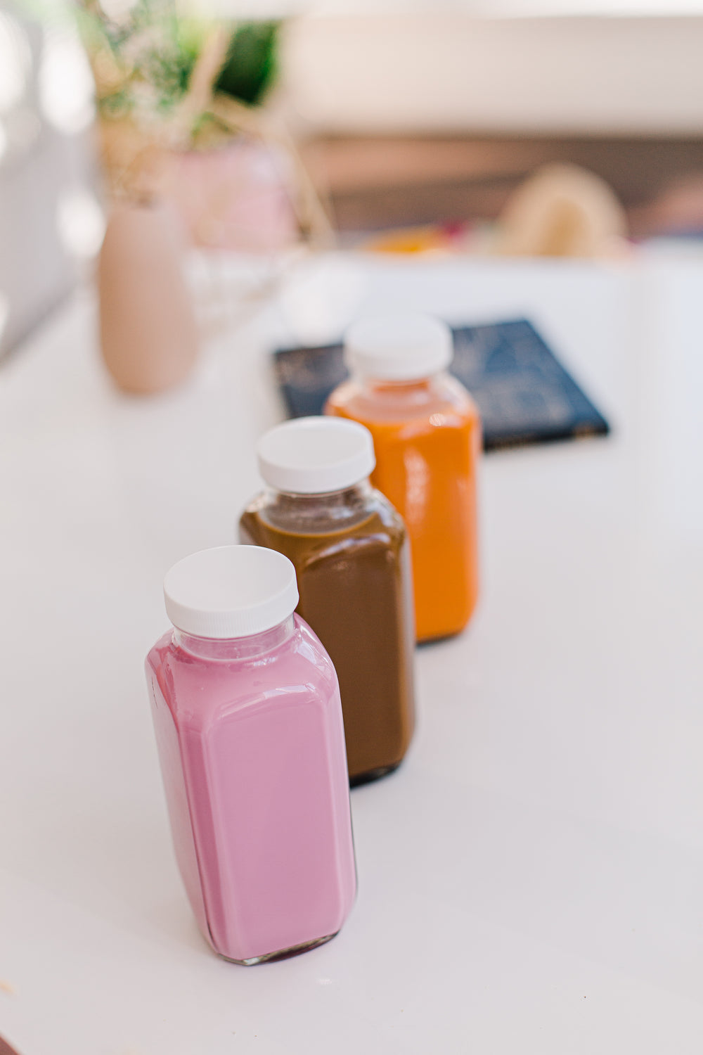 filled pink brown and orange jars