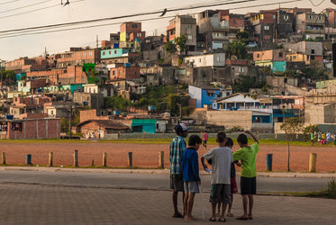 five children stand in a circle