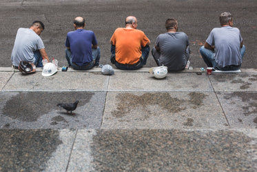 five construction workers on break