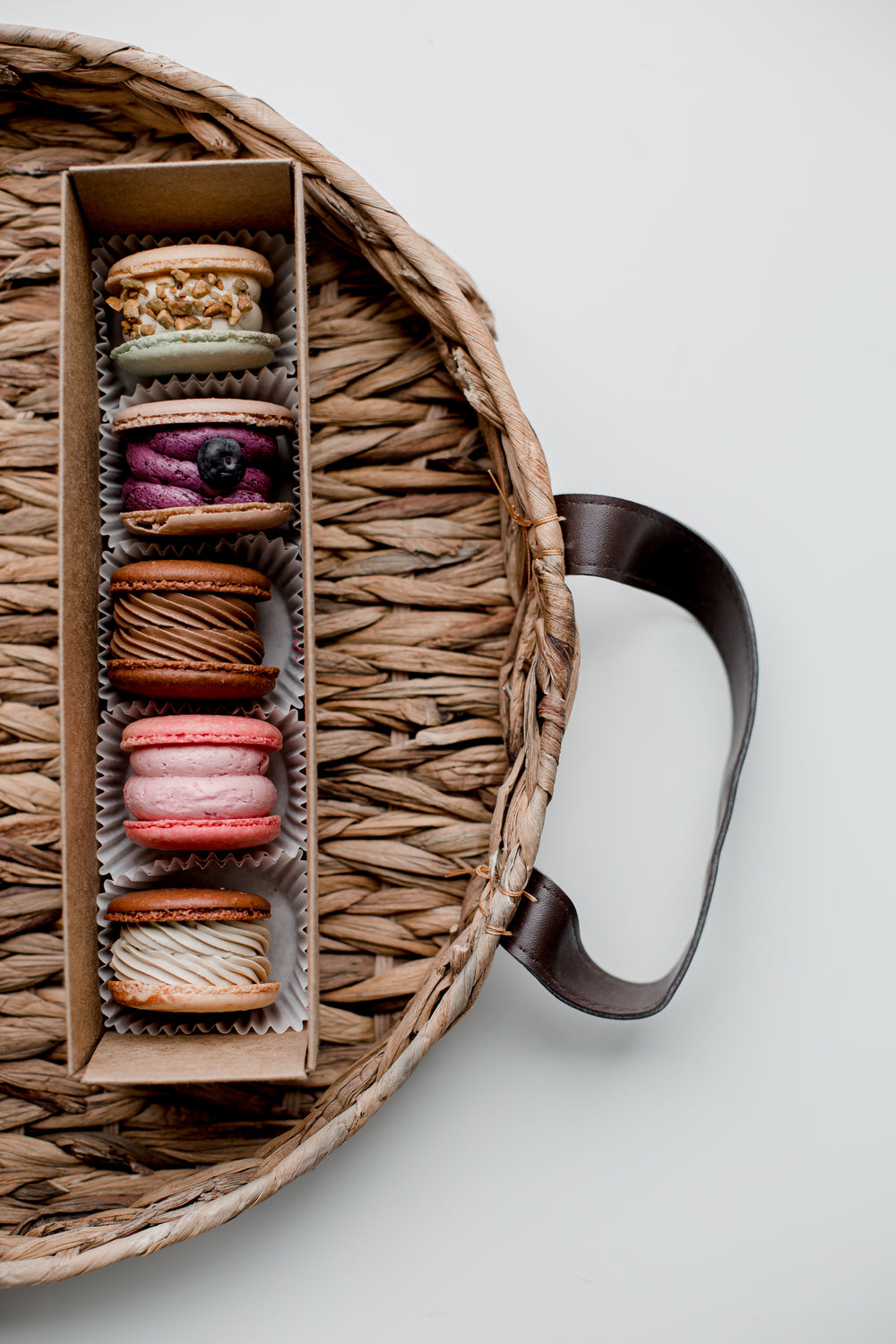 five different macarons in a package