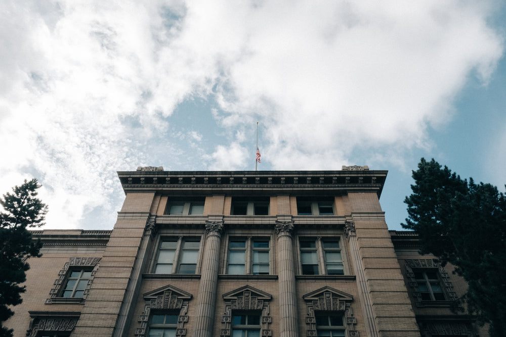 flag at half mast on city building