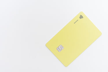 flatlay of a yellow plastic card with a tap chip in it