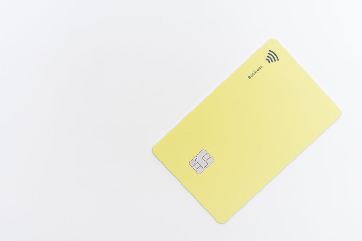 Flatlay Of A Yellow Plastic Card With A Tap Chip In It