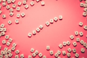 flatlay of blocks the middle spelling out stay well