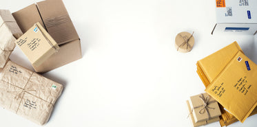 flatlay of boxes and envelopes on table