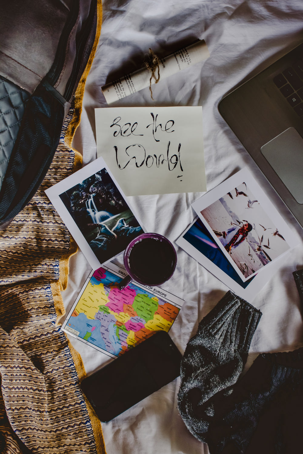 flatlay of coffee and items ready to travel