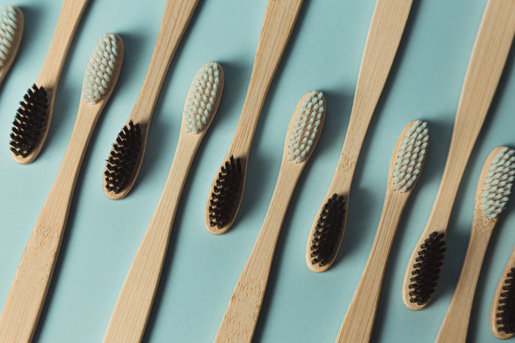 flatlay-of-wooden-toothbrushes-laying-br