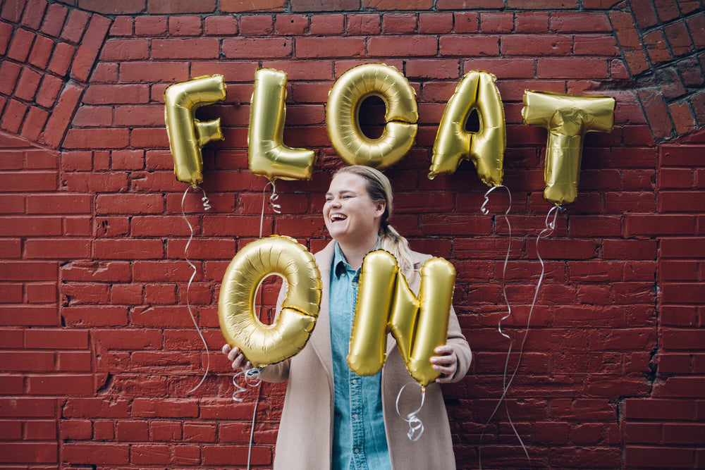 float on balloons and smiles