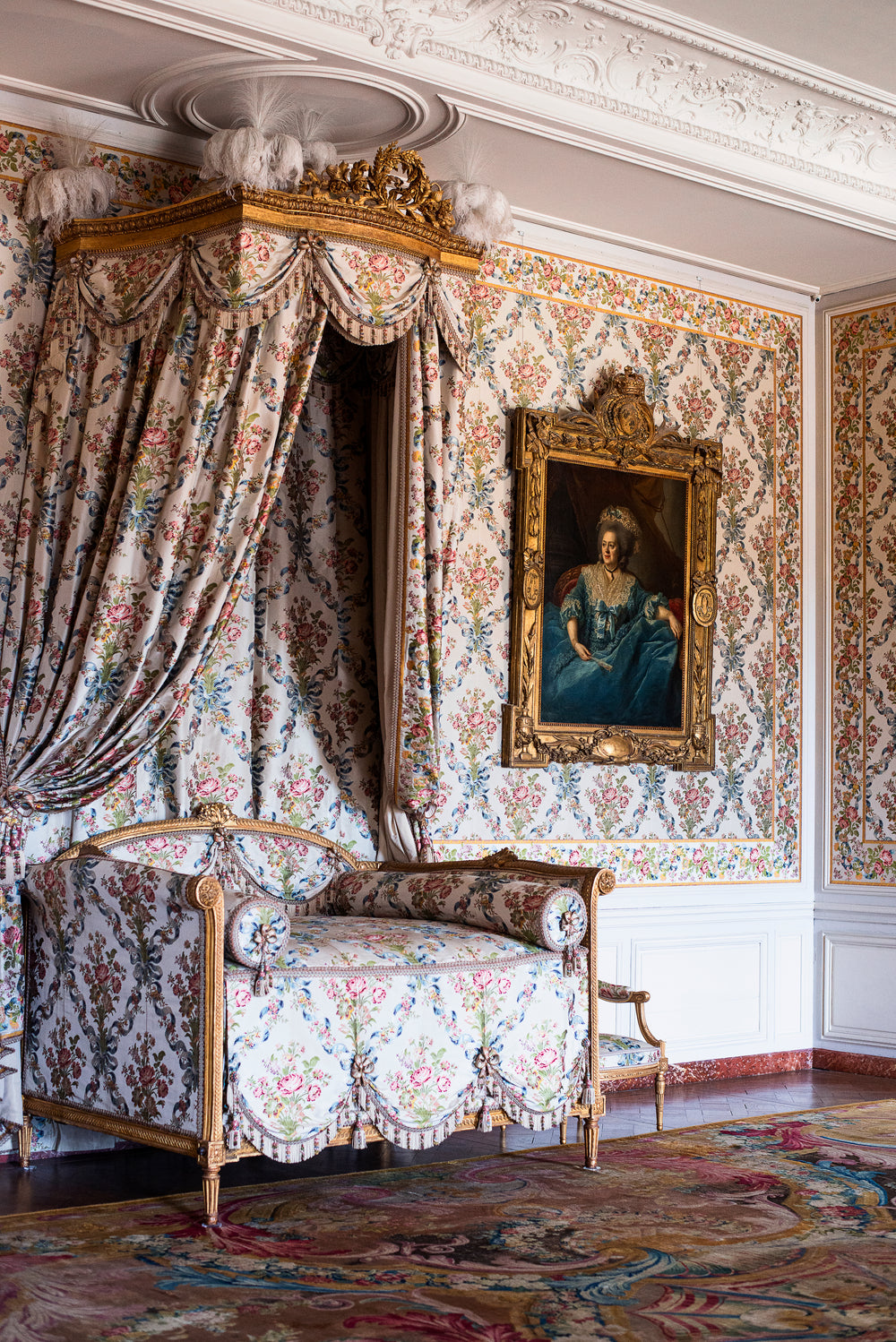 floral couch with matching wallpaper