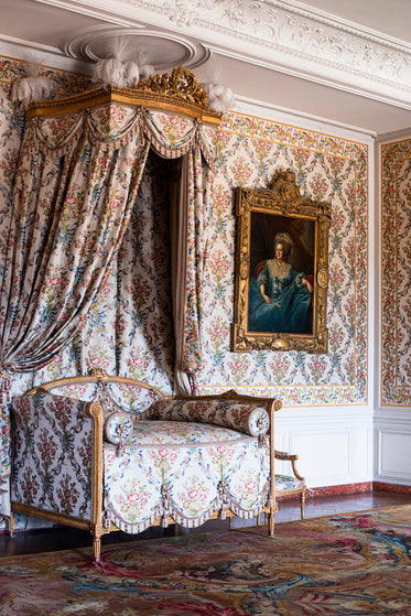 floral couch with matching wallpaper