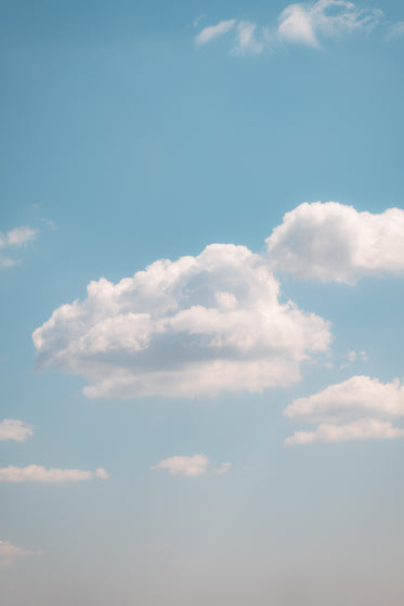 Browse Free HD Images of Fluffy Clouds In A Light Blue Sky On A Clear  Summer Day