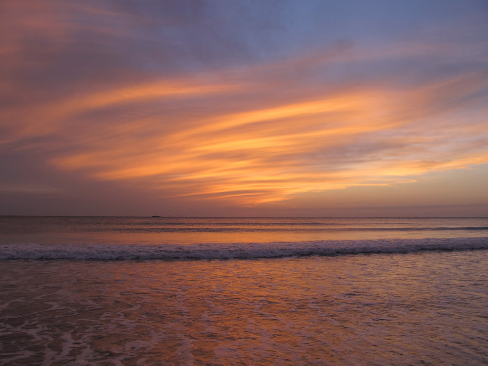 foam waves at sunset