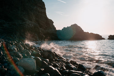 foamy wash on stone beach