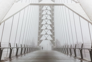 foggy walk on bridge