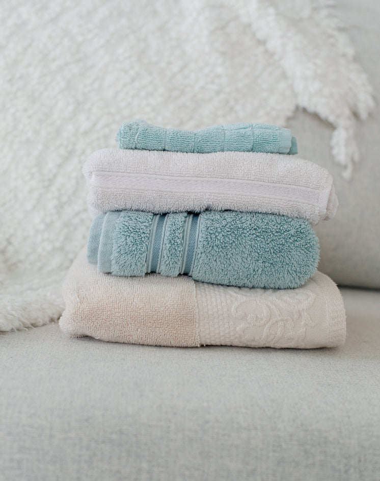folded-towels-placed-on-couch.jpg?width=