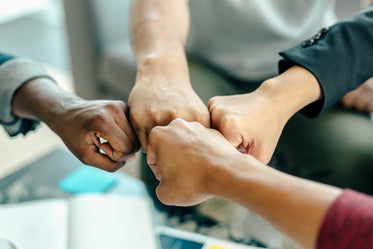 four way fist bump at work