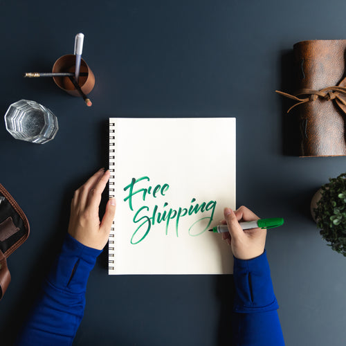 Free Shipping Written In Notebook