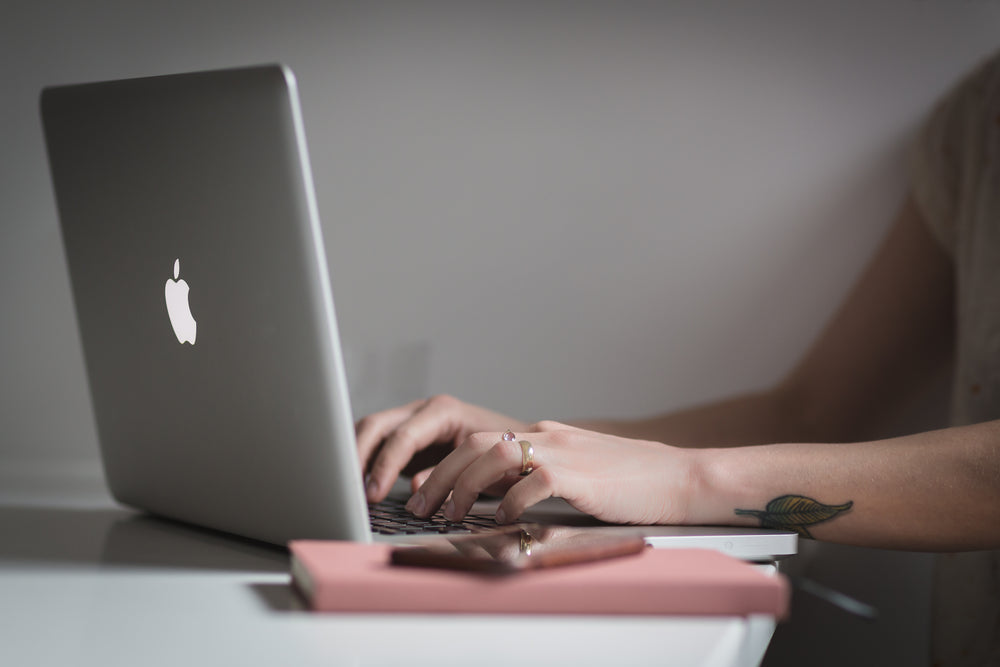 freelancer typing on keyboard