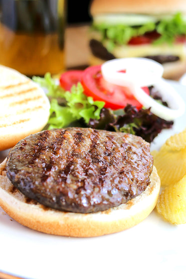 fresh grilled hamburger on bun