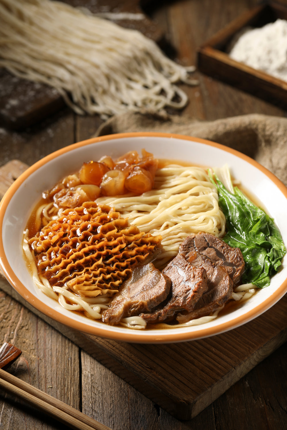 Fresh Noodle Soup With Meat Tripe Laying On Top