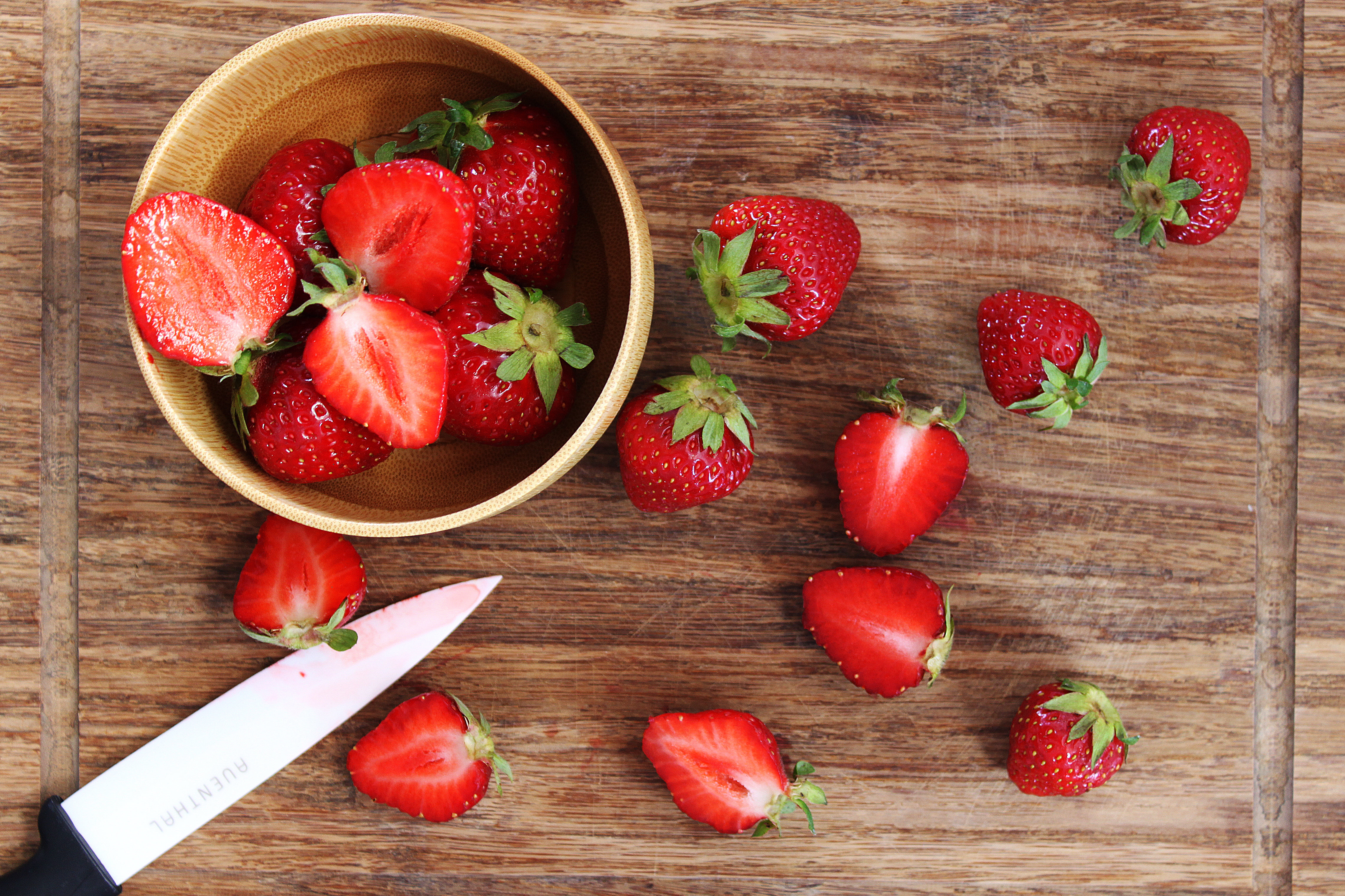 Fresh Strawberries Being Cut