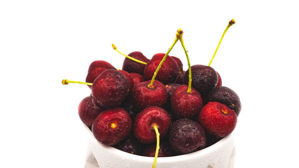 freshly washed cherries on display