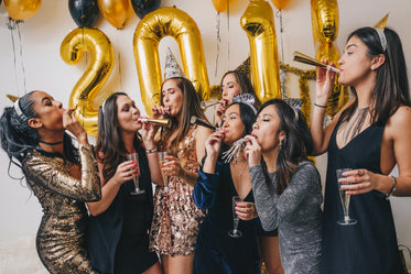 Picture of Friends Make Noise For New Years — Free Stock Photo