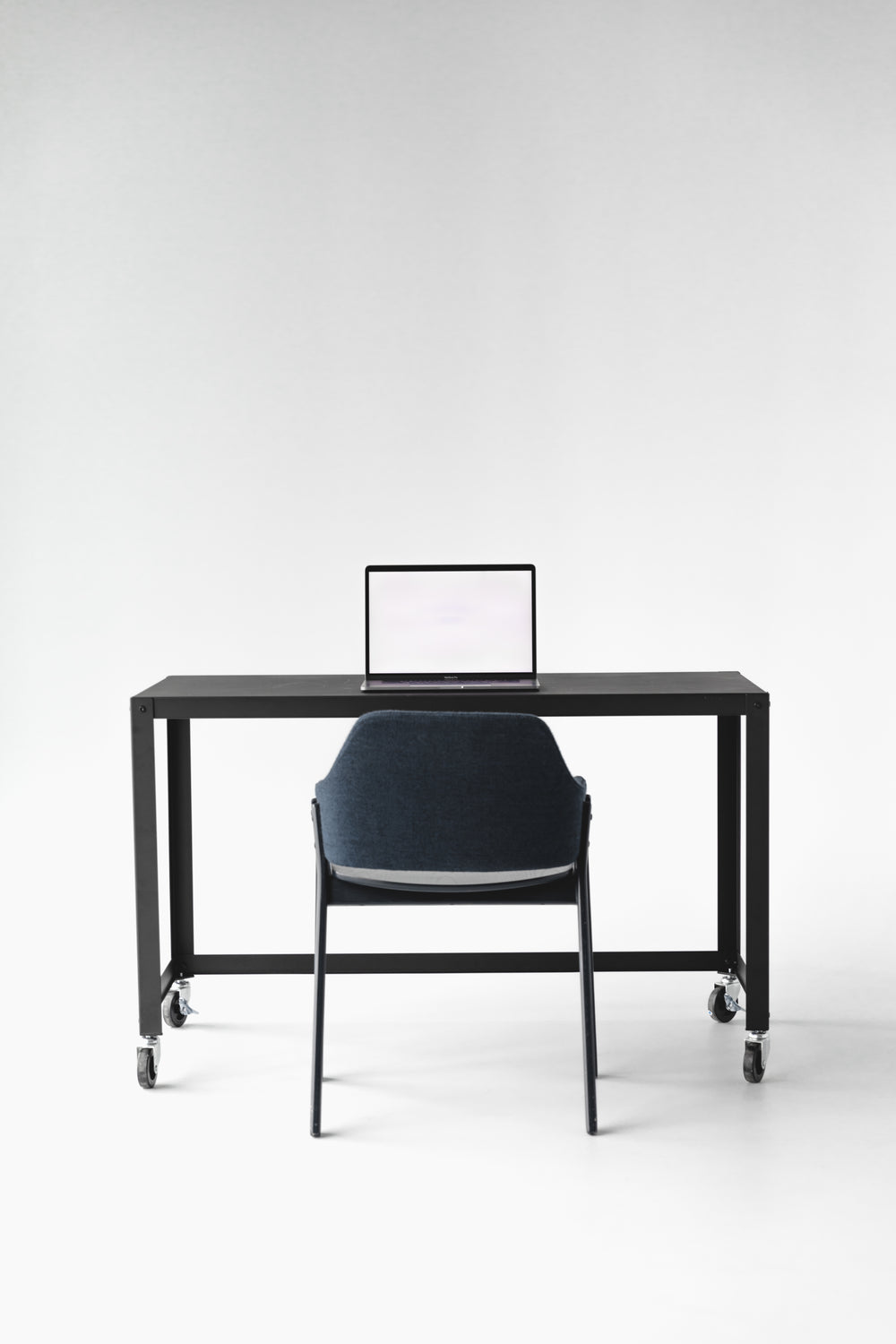 front facing view of clean desk and chair setup