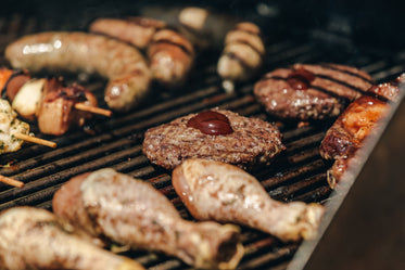 full bbq with burgers and bbq sauce