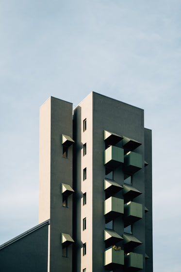 geometric grey building with square windows