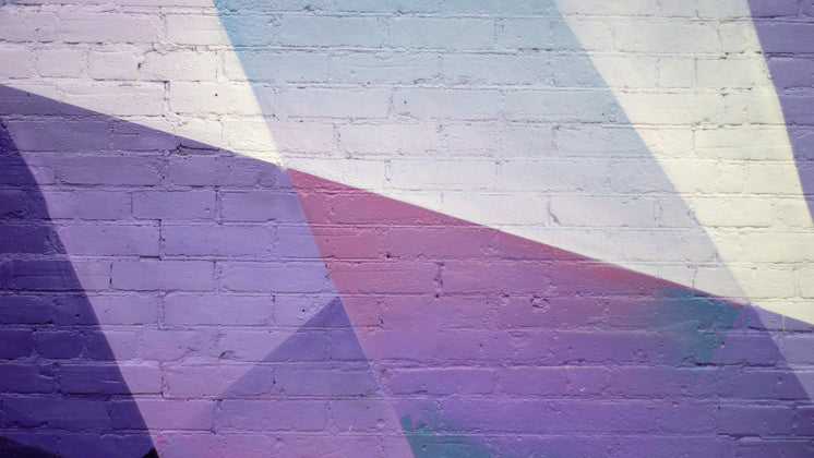 geometric-purple-urban-art-on-brick-wall