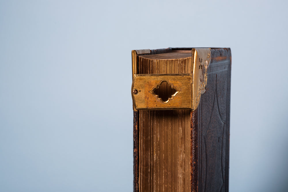 gilded pages of antique book