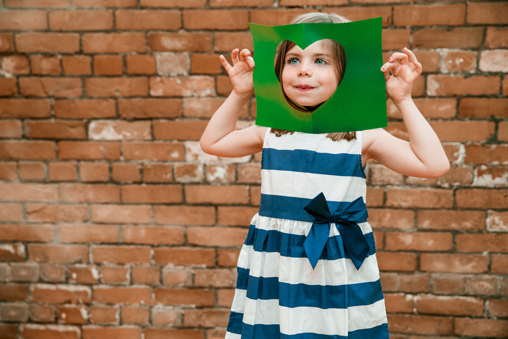 girl framed by heart