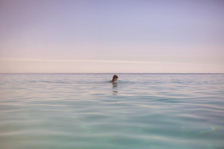 Girl In Beach Water