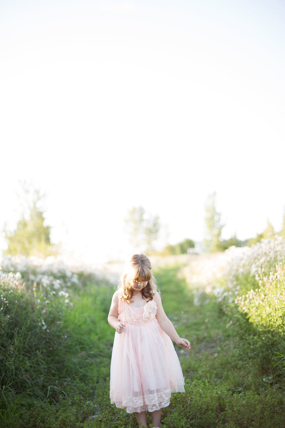 girl on grassy path