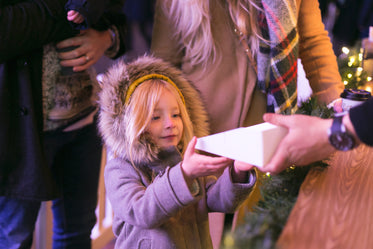 girl shopping at christmas market