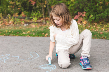 Picture of Girl Using Sidewalk Chalk — Free Stock Photo