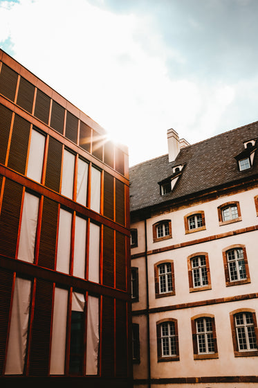 glimmer of sunilght over buildings